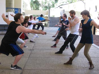 UCSC student acting interns rehearse fight scene for SSC