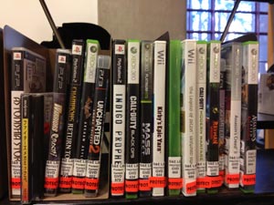 computer games on library shelf