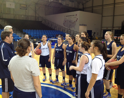 Photo of women's team practicing at Warriors arena