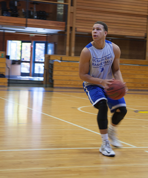 Student-athlete James Townsend, a captain of the UCSC men's basketball squad, is shooting 
