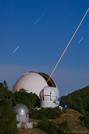 telescope dome with laser beam