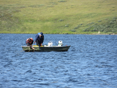 scientists in boat
