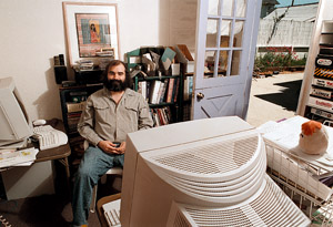Jim Kent in his garage office ca. 2000 (photo by Don Harris, UCSC Photo Services)