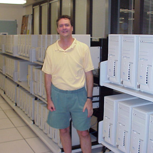 Haussler with the original Dell computer cluster used for the assembly of the first human 
