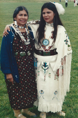 Teri Greeves's mother and sister beaded a buckskin dress and presented her with a pair of 