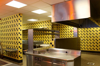 kitchen with yellow and black tile