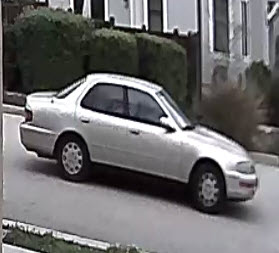 The suspect fled the area in a light gold four-door sedan with faded paint.