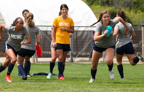 The women's soccer team practicing