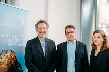 Institute for Humanities Research director Nathaniel Deutsch, UCSC alumnus Tony Michels, a