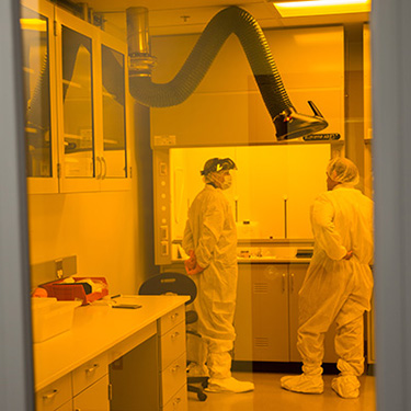 researchers in clean room
