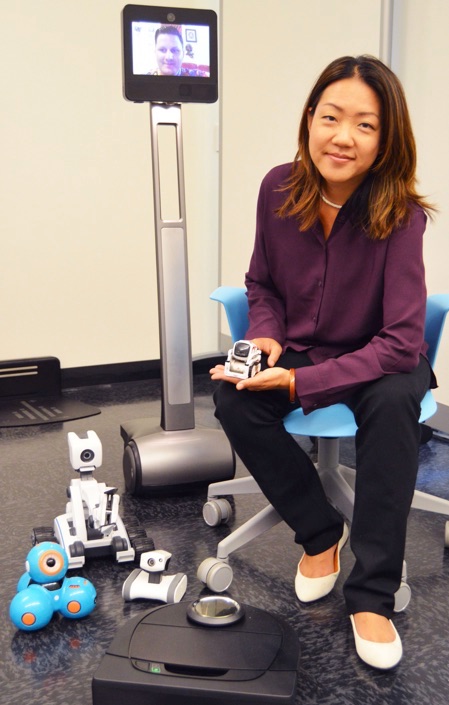 Photo of Leila Takayama and robots
