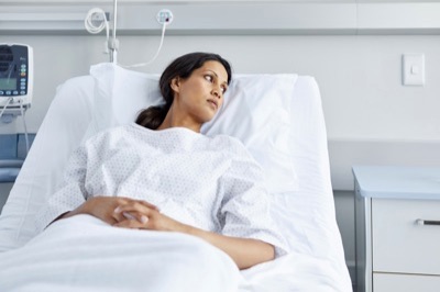 Photo of patient in a hospital bed