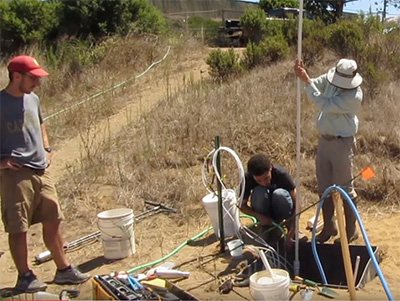 researchers working at field site