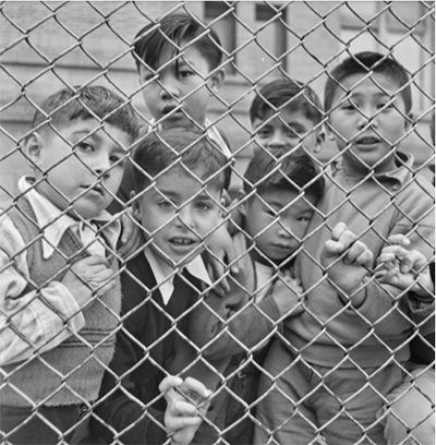 Children behind chain fence, 1948. Ruth-Marion Baruch, from Children, They Grow in the Cit