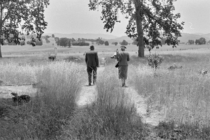 Couple at the cemetery, Last Memorial Day, 1956. Pirkle Jones, from Death of a Valley  (Sp