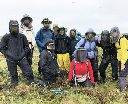 students in mosquito gear