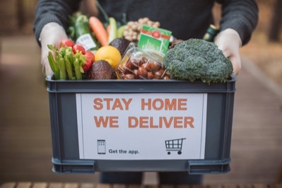 Close up of groceries in a bin being delivered