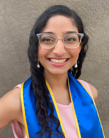 Garima Desai wearing her UC Santa Cruz graduation stole