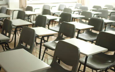 Empty desks inside a classroom