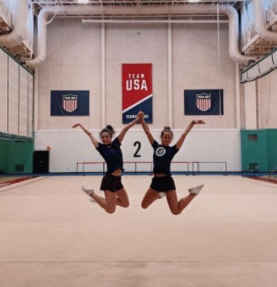 Izzy Connor, left, jumps with excitement with teammate Nicole Sladkov in Tel Aviv, Israel,