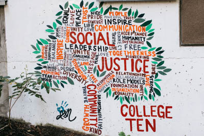A mural that says "College Ten" and the words "social justice"
