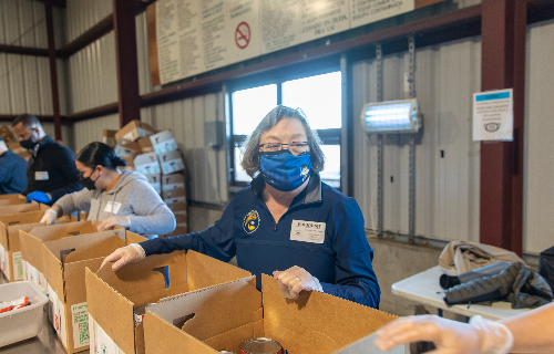 Chancellor Cynthia Larive was among UCSC volunteers who recently helped load food donation