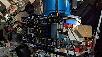 Blue, red, and grey telescope instrumentation at the Lick Observatory.