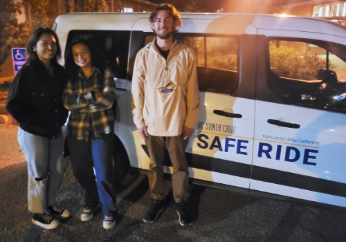 Students standing in front of van with a Safe Rides driver
