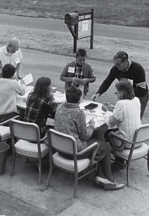 Smith assisting new students in registering on opening day, 1965. (Photo by Vester Dick)  