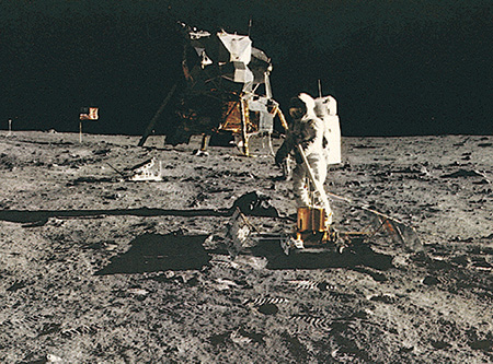 lunar module and astronaut on moon