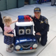 Lt. Garcia with a young child.