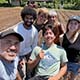 The farm robotics team smiles while at the UCSC farm
