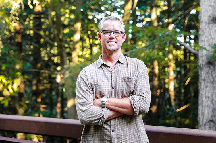 portrait of Don Smith with forest background