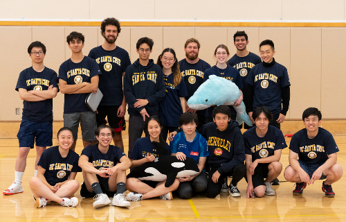The full table tennis team, and their traditional game-day plushies—appropriately marine m