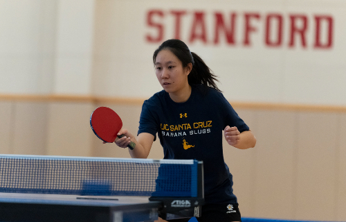 Co-captain Jing-Ting Lai keeps her eye on the ball during tournament play at Stanford Univ