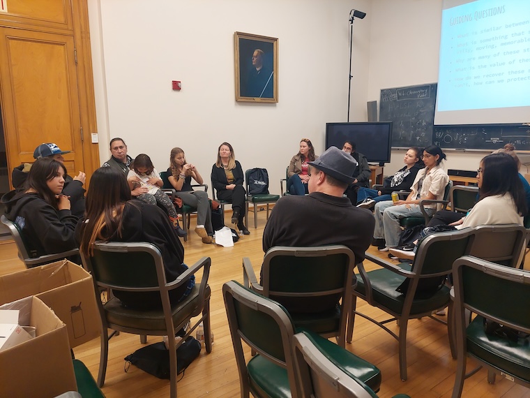 Attendees sitting in a circle