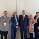 Stacy Philpott with members of the U.S. hackathon team and government administrators