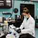 Vicky Oelze handles samples in isotope lab equipment