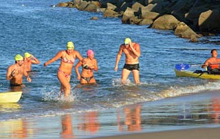Slug swim team braves cold, jellies in eighth annual bay crossing