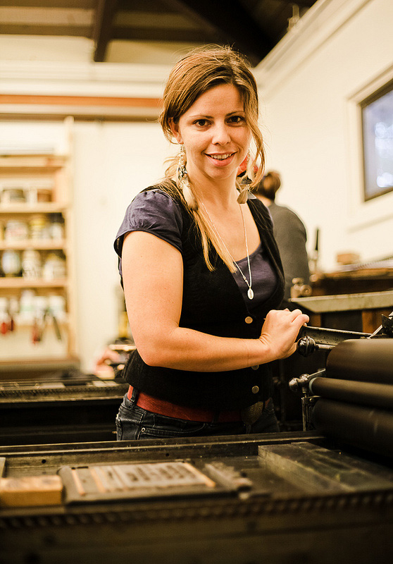 Student using the press