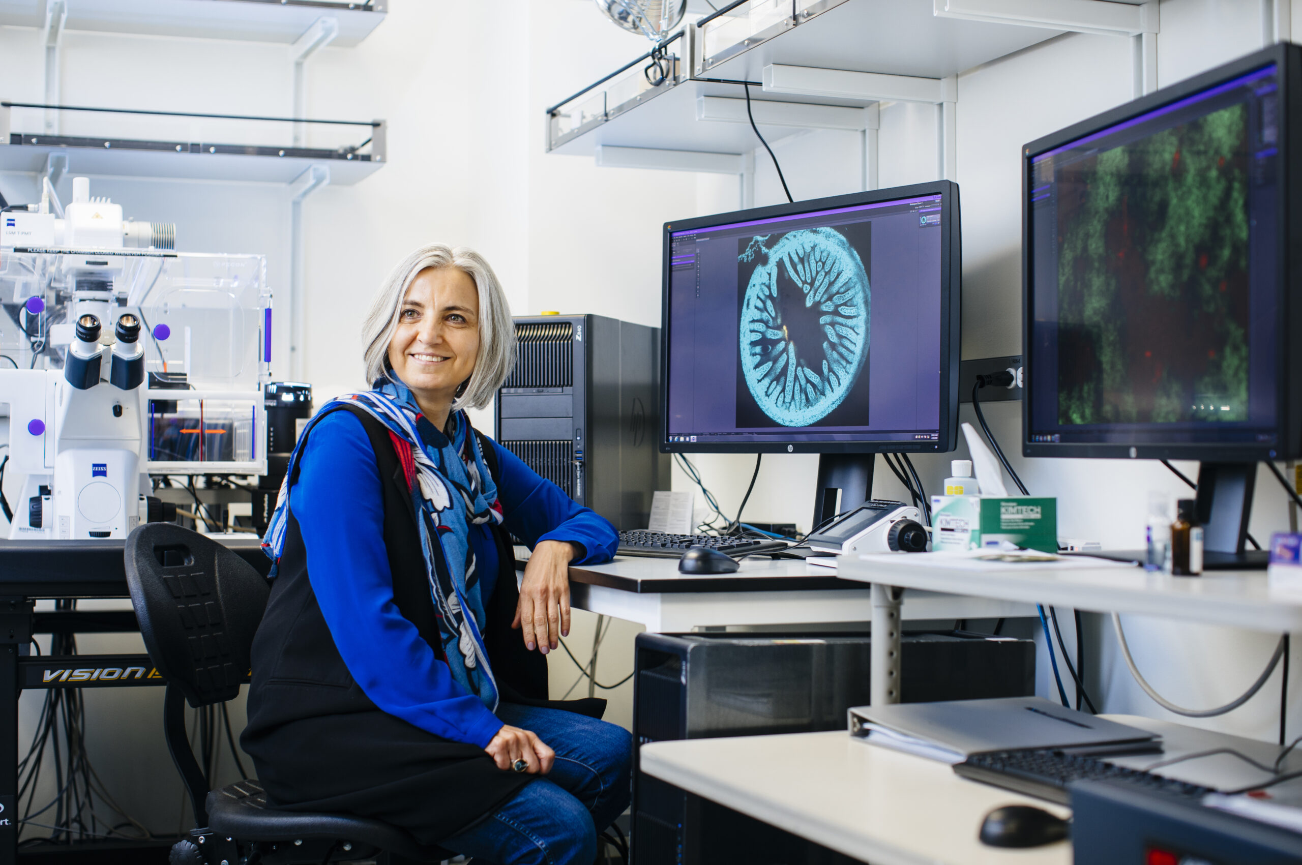 Fitnat Yıldız seated in front of a computer in the lab