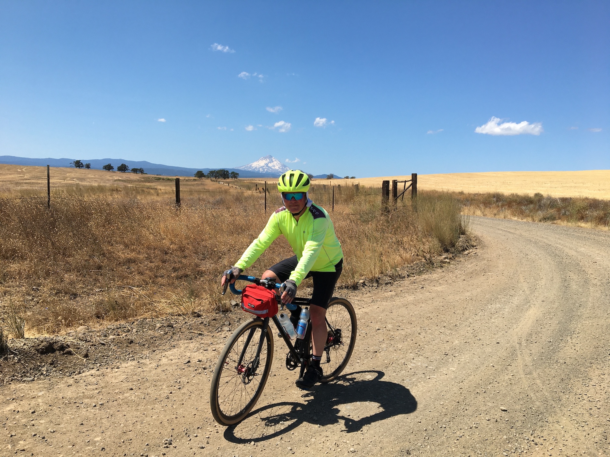 UC Santa Cruz Professor William Scott on a bike on a dirt road