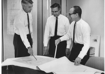 Archival photo of Bruce Lane at work