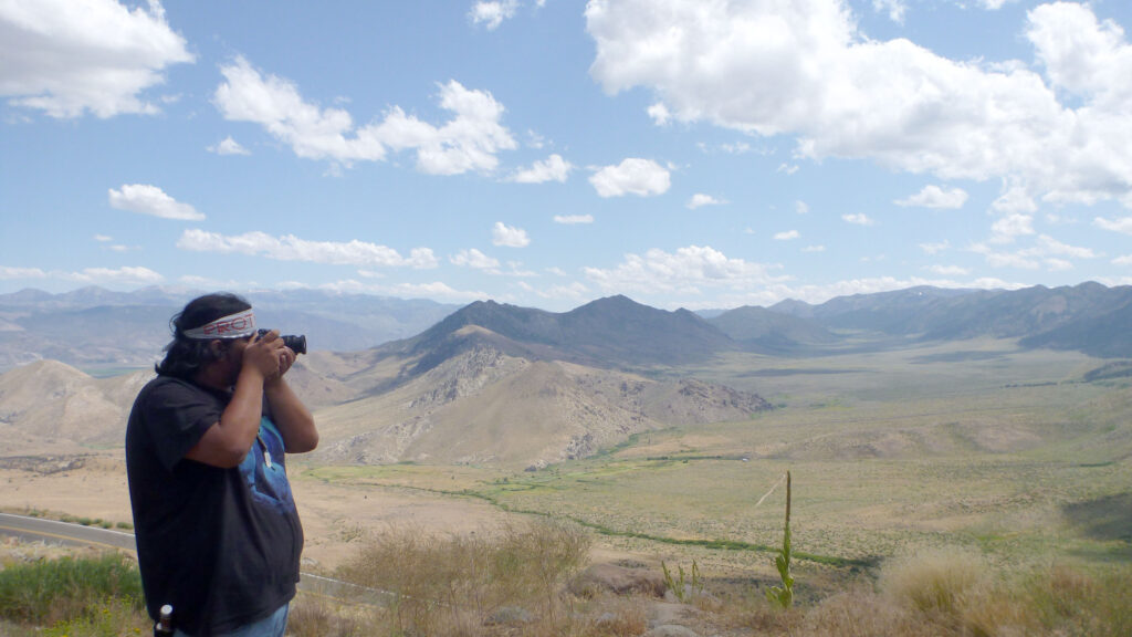 student takes a photo