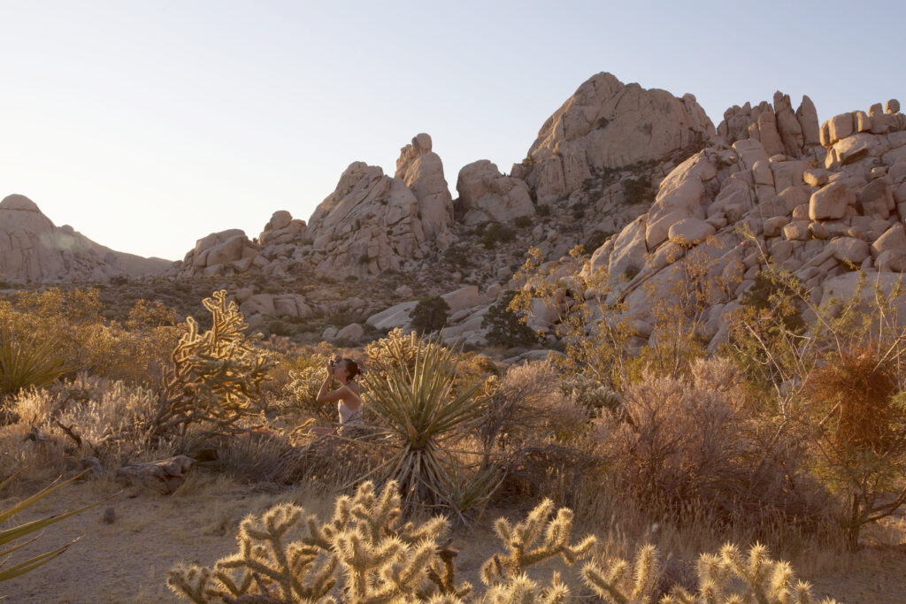 UCSC student taking photo at Granites.
