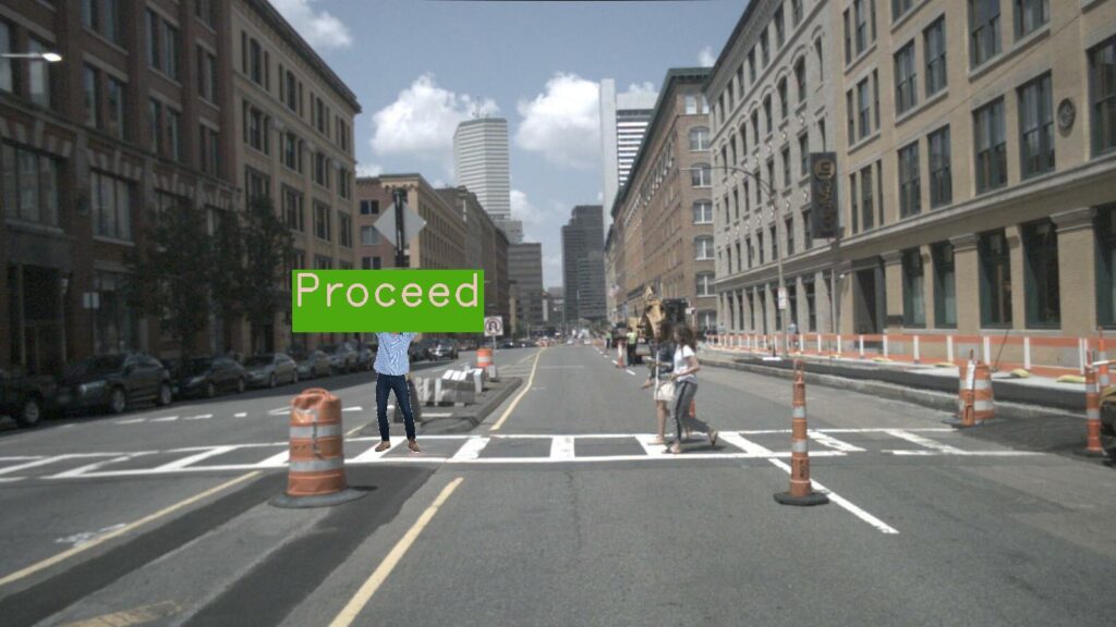 City street background, yellow text on green backgorund reads "proceed"