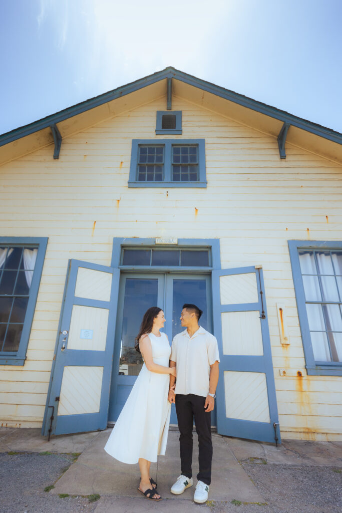Criz Santos and Celsey Taylor at Pigeon Point Lighthouse gazing at one another
