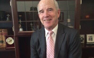 Headshot of Tim Shannon in an office.