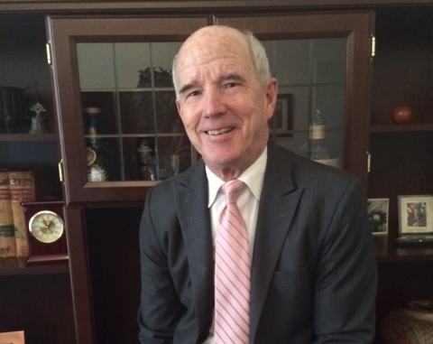 Headshot of Tim Shannon in an office.