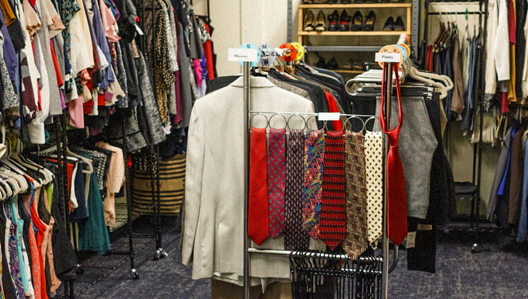 clothes hanging in the career clothing closet